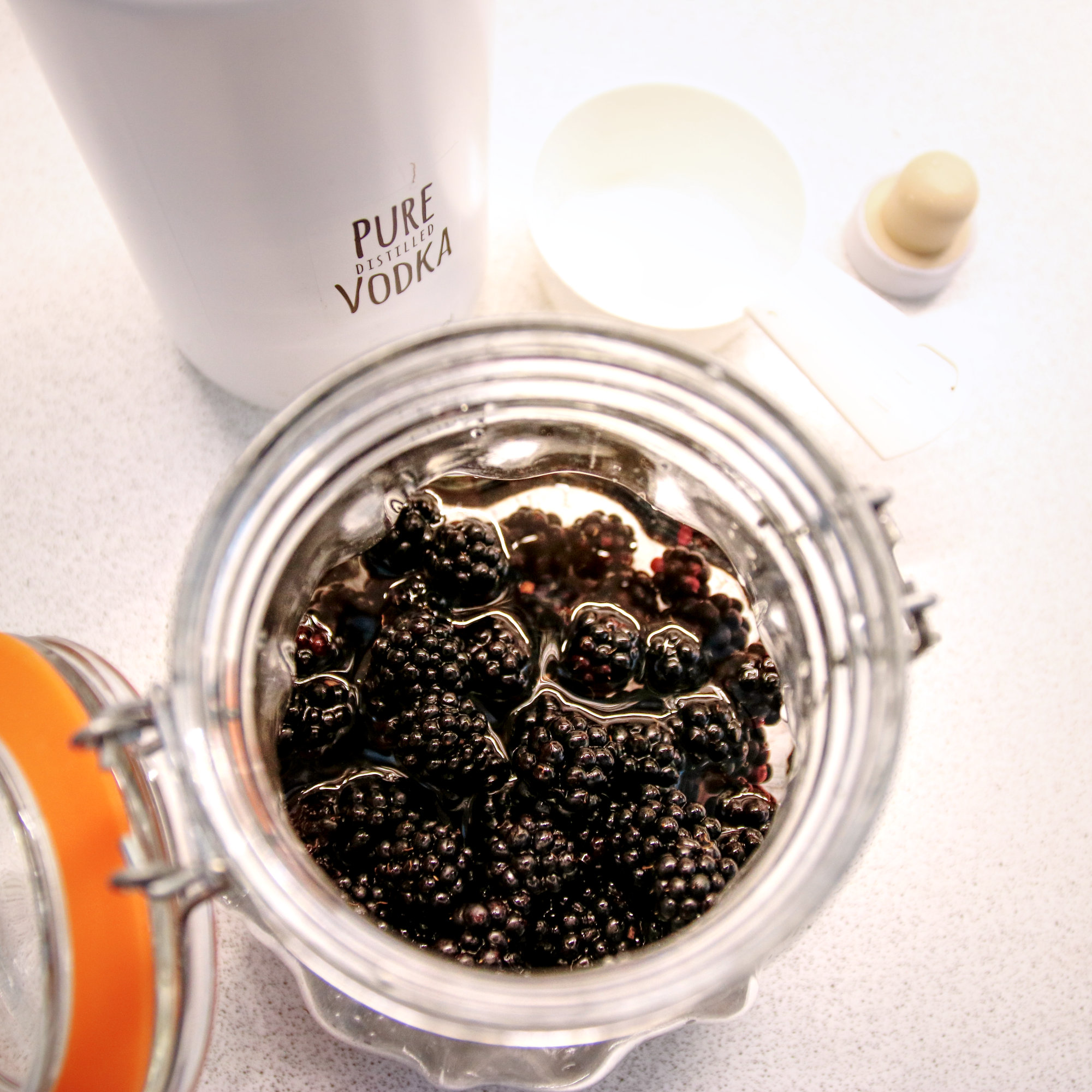 Step 1 - Add the vodka to the blackberries